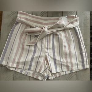 High rise linen blend tie waist shorts. MIDI length